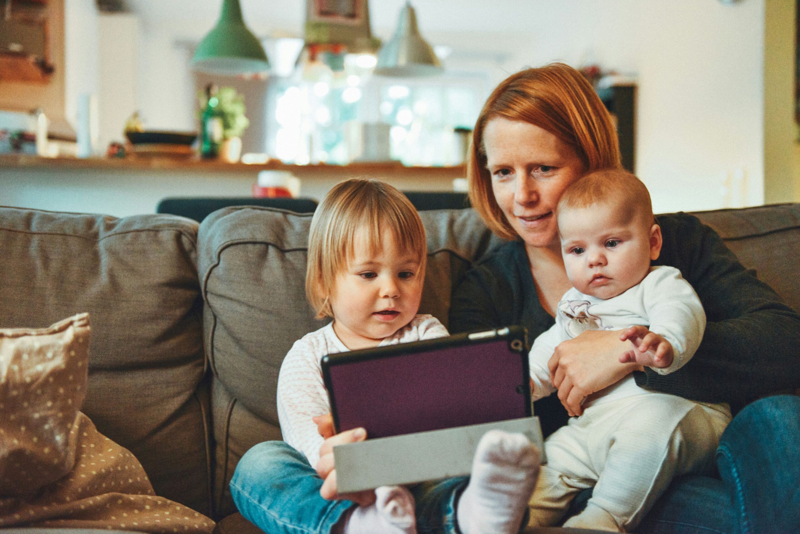Family using digital tablet photo